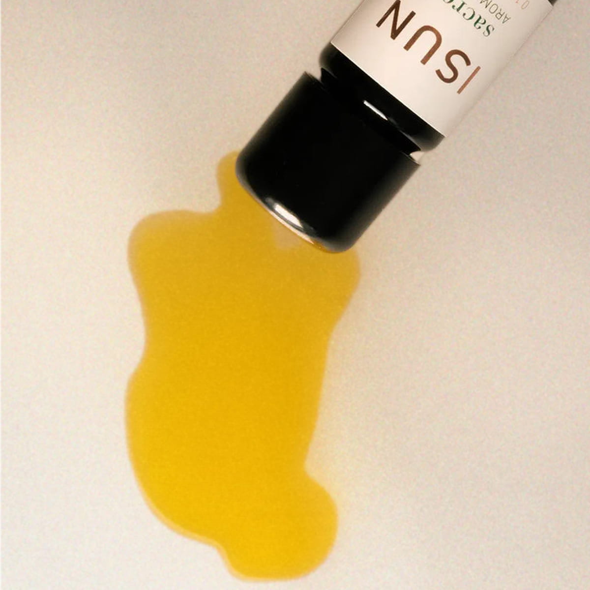 Close up of ISUN Sacred Aromablend (5 ml) showing product swatch