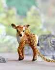 Camp Hollow Newborn Fawn Necklace - Product displayed on colorful background