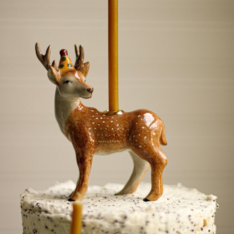 Camp Hollow Stag Cake Topper - Closeup of product on top of cake