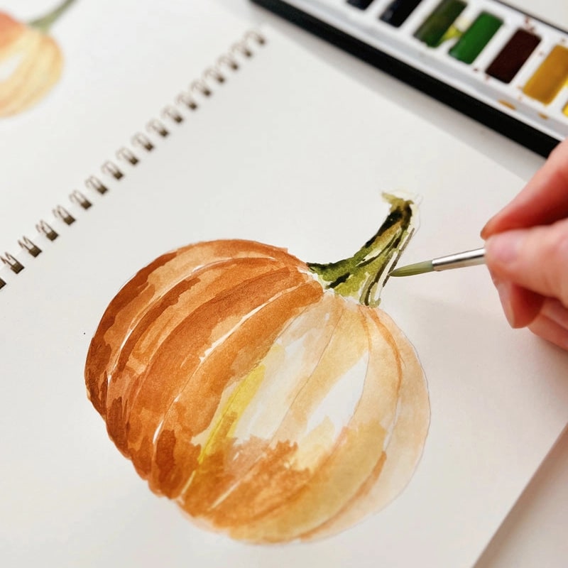Emily Lex Studio Autumn Watercolor Workbook (1 pc) - model shown painting inside product