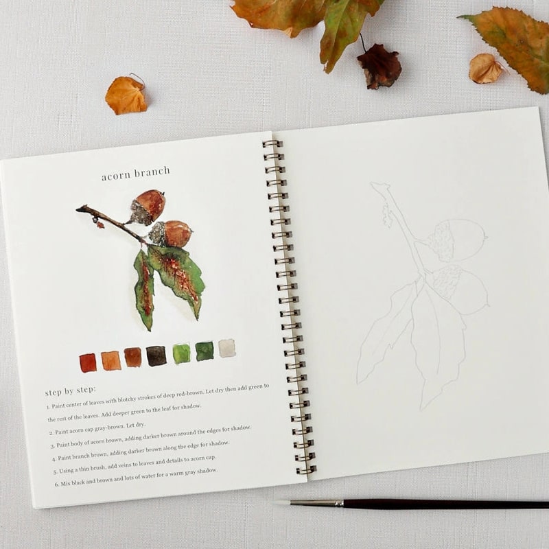 Emily Lex Studio Autumn Watercolor Workbook (1 pc) - model shown painting inside product