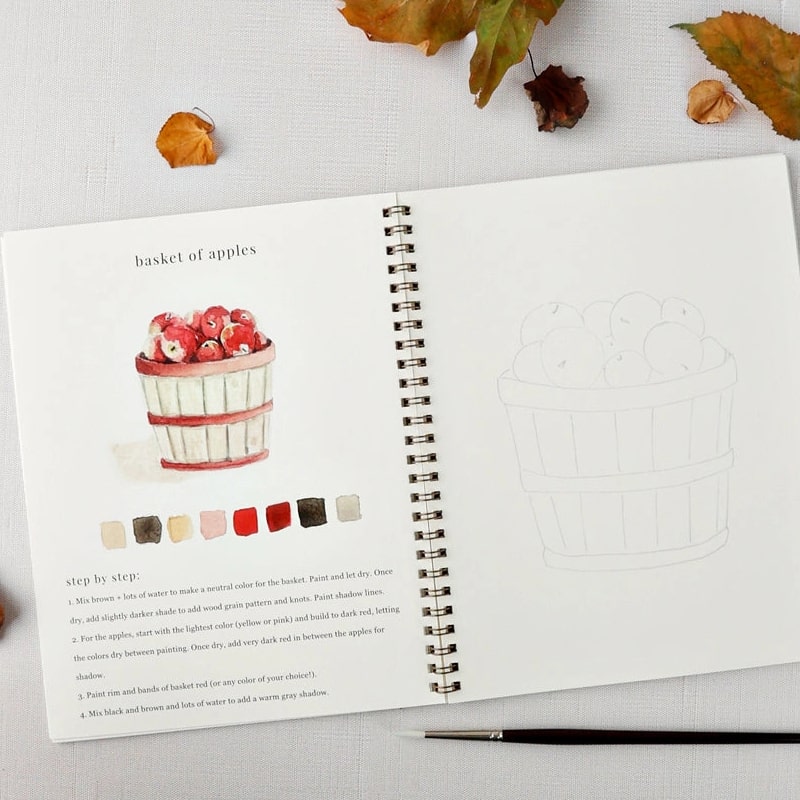 Emily Lex Studio Autumn Watercolor Workbook (1 pc) - inside of product shown with paintbrush