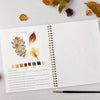 Emily Lex Studio Autumn Watercolor Workbook (1 pc) - inside of product shown with paintbrush