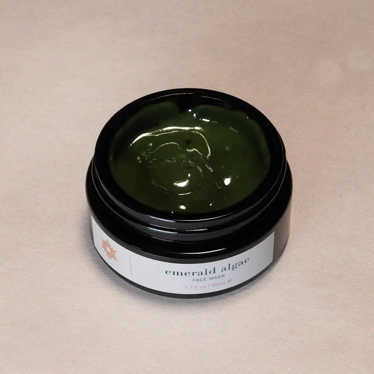 ISUN Emerald Algae Face Mask (50 ml) with lid off showing color and texture of product inside