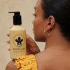 Nopalera Cactus Shower Gel - model holding gel bottle on shoulder