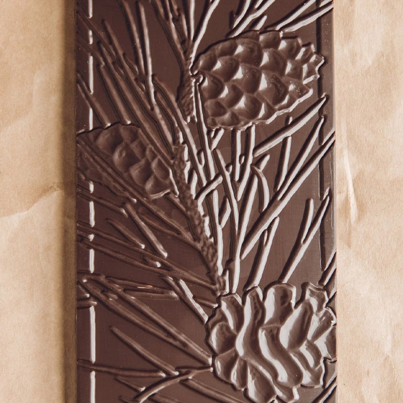 Wildwood Chocolate Limited Edition Fig with Pomegranate - Product displayed on brown background