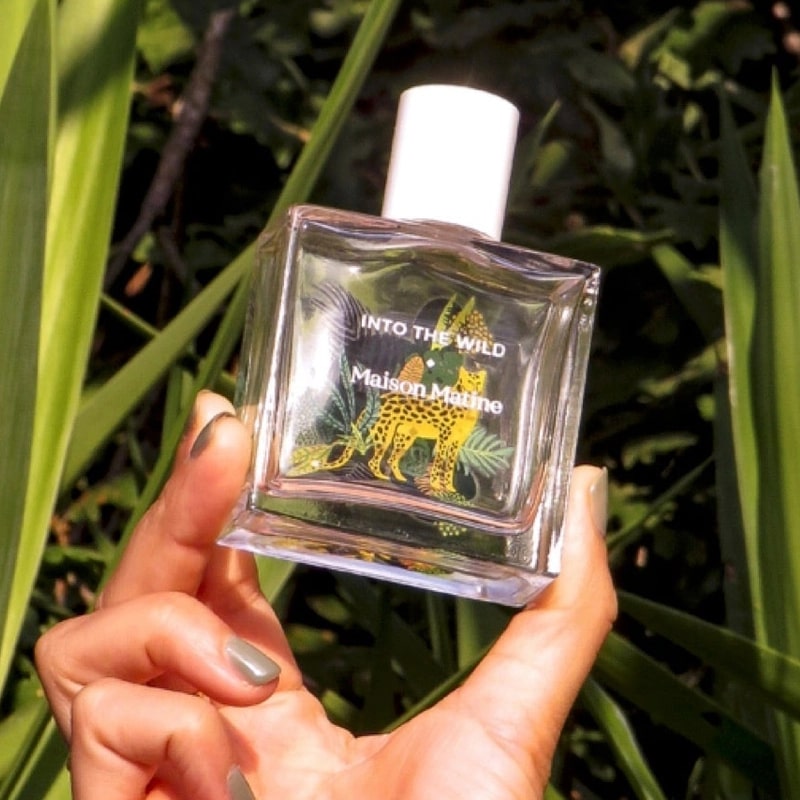 Maison Matine Into the Wild Eau de Parfum (50 ml)  - Product shown in models hand