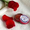 C.O. Bigelow Rose Salve Tin - No. 012 - Beauty shot, product shown with rose and petals