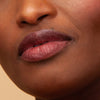 Flyte.70 S+S.LipSheer Tinted Lipstick Balm - Wishing Well on model's lips