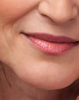 Flyte.70 S+S.LipSheer Tinted Lipstick Balm - Kid showing lipstick balm on model's lips