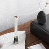 Kunjudo Washi Paper Incense Strips - Elegant Agarwood - lifestyle photo of incense burning in metal clip, and stone platform on wood table