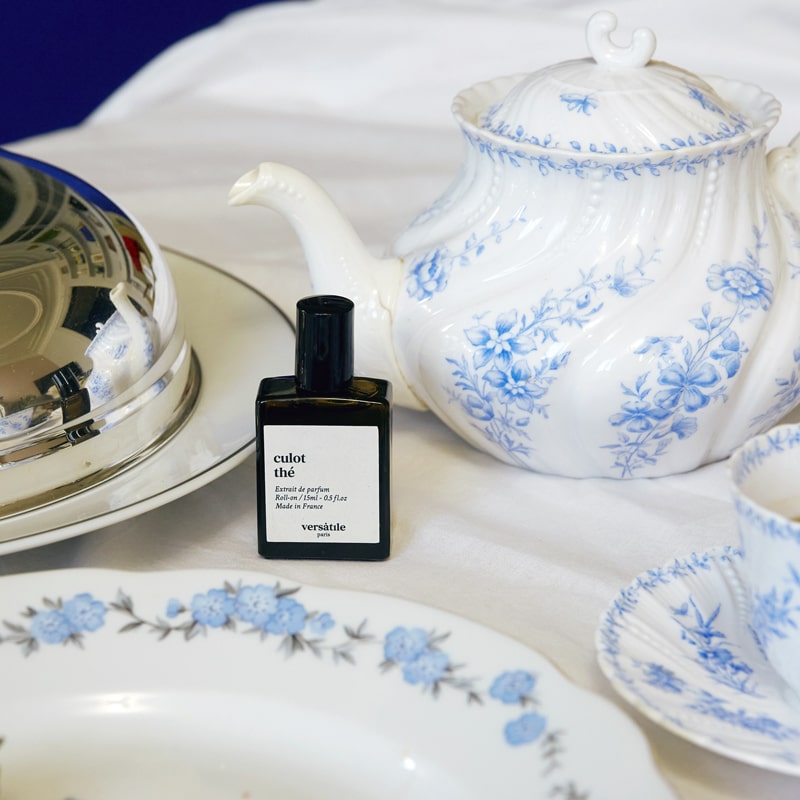 Versatile Paris Culot The (Tea Cap) Extrait de Parfum shown with tea set
