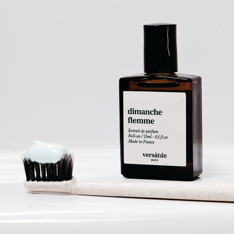 Versatile Paris Dimanche Flemme (Lazy Sunday) Extrait de Parfum beside toothbrush with toothpaste