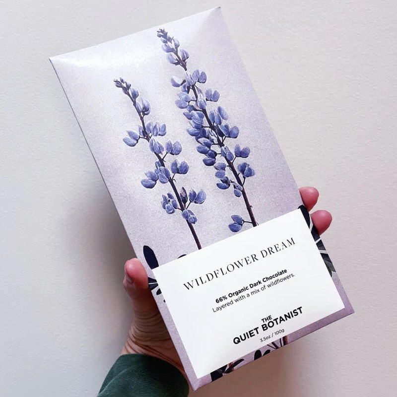 The Quiet Botanist Wildflower Dream Chocolate Bar- Product shown in models hand