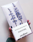 The Quiet Botanist Wildflower Dream Chocolate Bar- Product shown in models hand