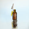 Susanne Kaufmann Face Oil - Product shown with dropper resting on top