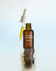 Susanne Kaufmann Face Oil - Product shown with dropper resting on top
