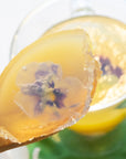 Umami Insider Pressed Dried Edible Flowers - Closeup of product on spoon