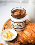 Confiture Parisienne Hazelnut Spread - Product shown on wood serving tray