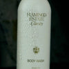 Flamingo Estate Organics Peppermint & Juniper Berry Body Wash - bottle with water drops on it