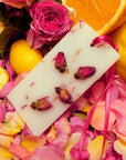 Santa Maria Novella Rosa Novella Scented Wax Tablets - Beauty shot, product shown on top of fruit and flowers