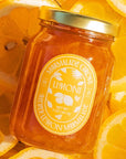 Marmalade Grove Meyer Lemon & Honey Marmalade - Overhead shot of product on top of lemon slices