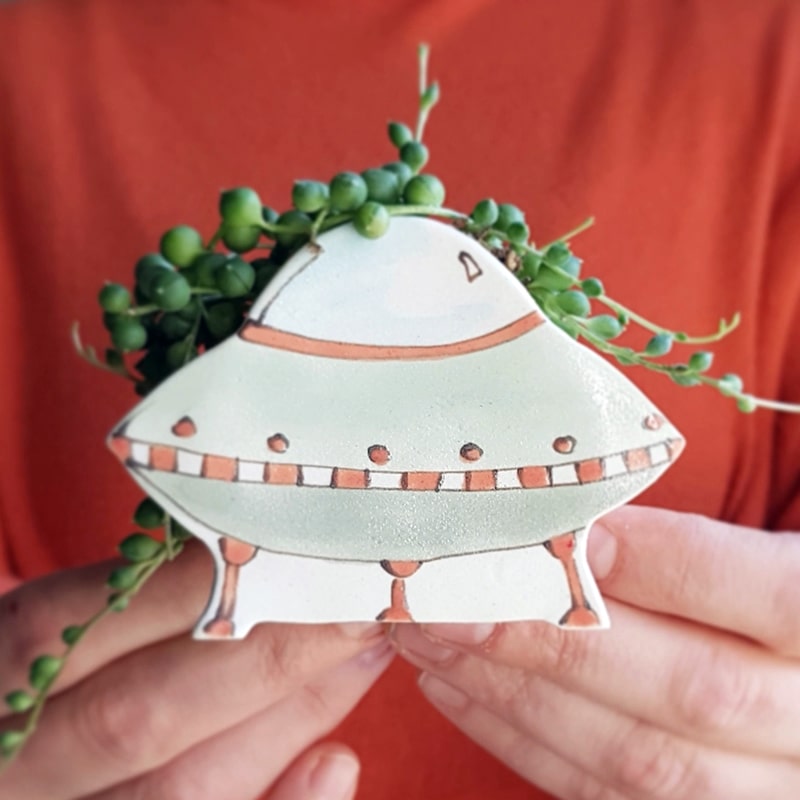 Julie Richard Ceramist Small UFO Ceramic Planter - Product shown in models hands