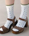 Tiepology Little Daisy Diamond Shape Socks - Ivory - Closeup of model wearing product