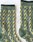 Tiepology Little Daisy Diamond Shape Socks - Warm Sage - Closeup of product