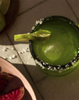 Nopalera Tepoztlan Candle- Overhead shot of vessel being used as drink glass