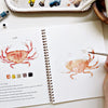 Emily Lex Studio Seaside Watercolor Workbook - Painted crab shown