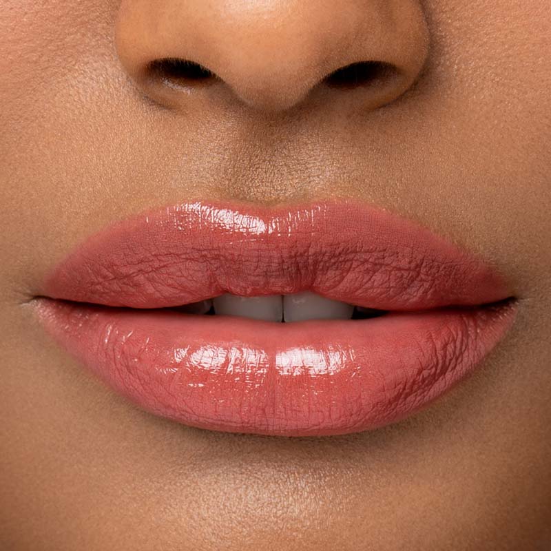 Chantecaille Limited Edition Sea Turtle Lip Chic - Rosea - Product shown on dark skin