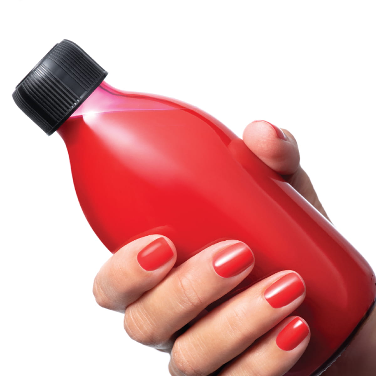 Close up of model wearing Kure Bazaar Nail Lacquer - Spicy Vvee holding bottle