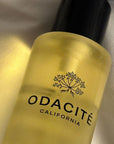 Odacite C-Glow Hydra-Firm Body Oil - Closeup of product