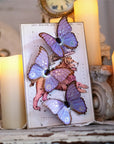 Moth & Myth Celestial Beings Morpho Paper Butterfly Set - Product shown with candles