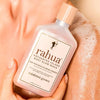 Rahua Enchanted Island Body Glow Wash - Product shown in models hand