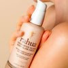 Rahua Enchanted Island Body Glow Cream - Closeup of product in models hand