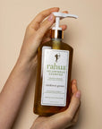 Rahua Voluminous Shampoo (475 ml Lush Pump) - Product shown in models hand