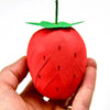 TOPS Malibu Mini Surprize Ball Strawberry - Closeup of product in models hand