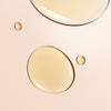 Nuxe Reve de Miel® Honey Lip Care - Product droplet showing color/texture