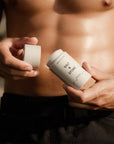 Salt & Stone Santal & Vetiver Deodorant - Model shown with product in hand