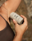 Salt & Stone Santal & Vetiver Deodorant - Model shown applying product