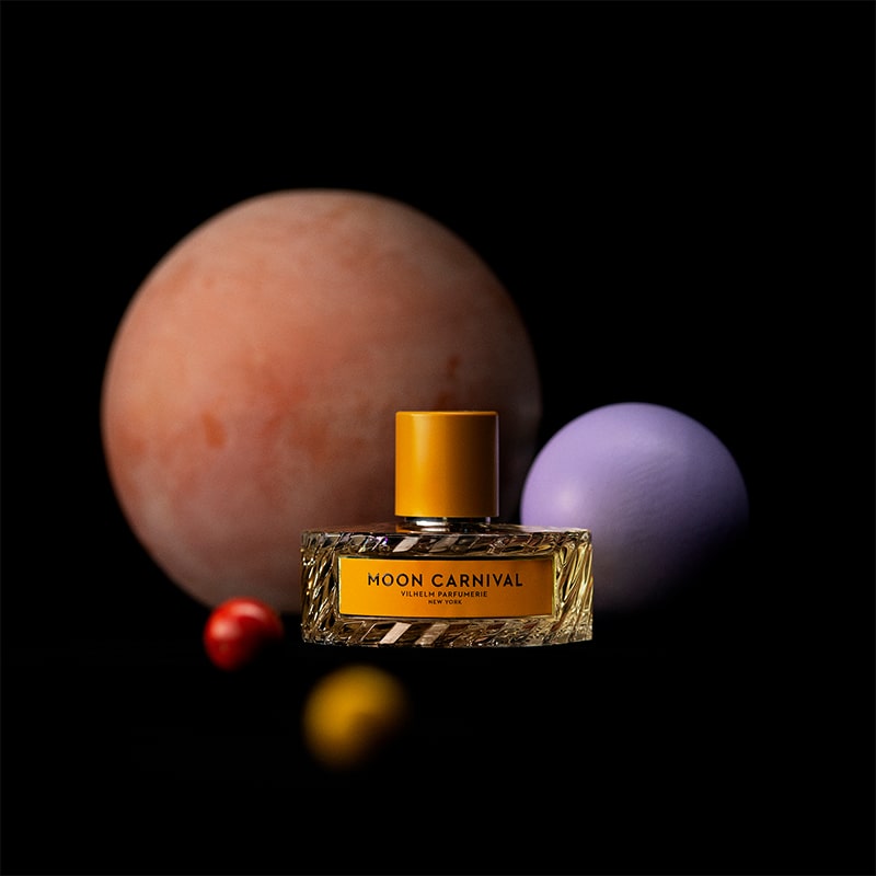 Vilhelm Parfumerie Moon Carnival Eau de Parfum - product shown in front of moons and balls