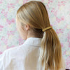Bachca Paris Gold Metal Clip - model shown wearing metal clip in hair