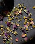 Leaves and Flowers Ikebana Loose Leaf Tea - Loose leaf tea spread out on table