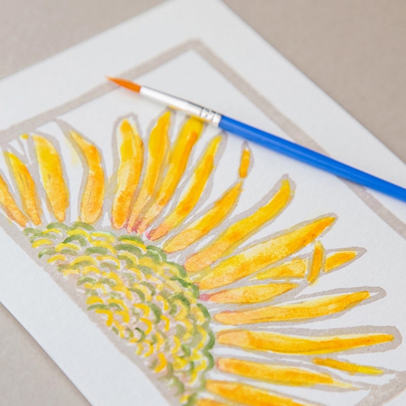 Ashes &amp; Arbor Sunflowers Watercolor Card Art Kit - Closeup of product with paintbrush on top