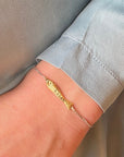 Sophie Deschamps Bijoux Ablette Gold Plated Fish Bracelet - Closeup of product on models wrist