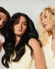 Oribe Hair Alchemy Heatless Styling Balm - Models shown after using product