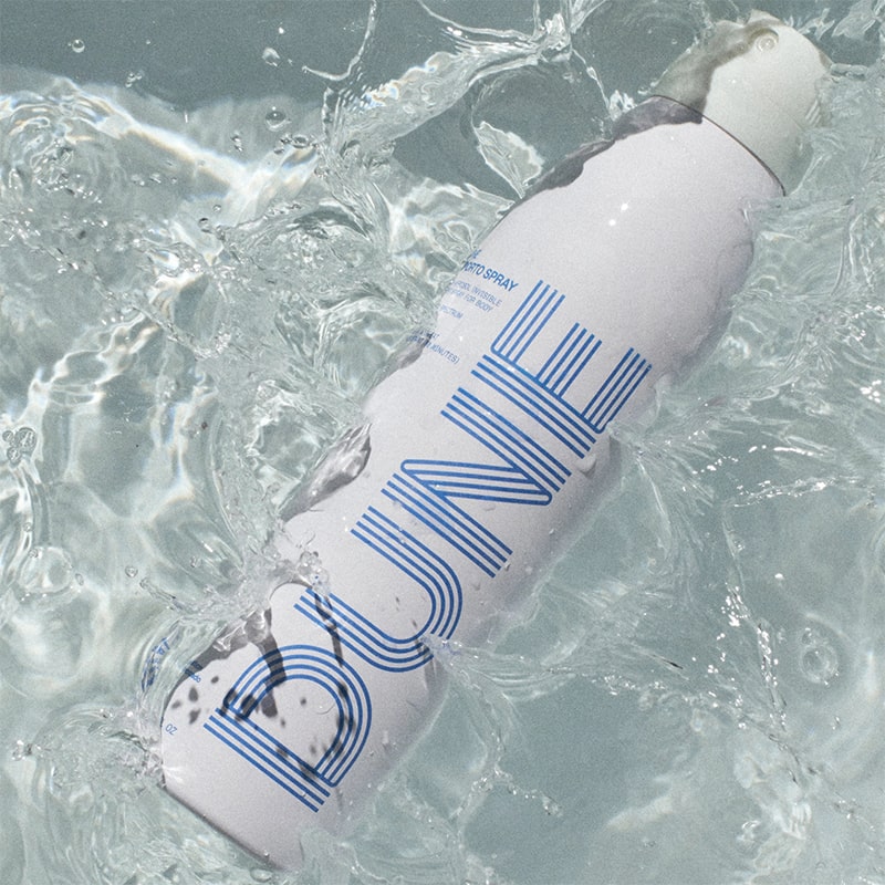 DUNE Suncare The Sporto Spray - Product shown in water