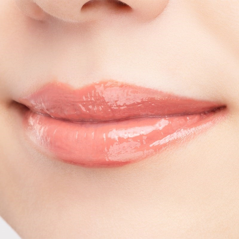 Paul + Joe Lipstick Refill - Wool Cardigan (23) - Closeup of product applied to models lips